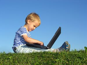 Child with computer.jpg