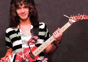 Eddie-van-halen su gitara ir cigarete.webp