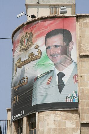 Sirija asadas plakatas.jpg